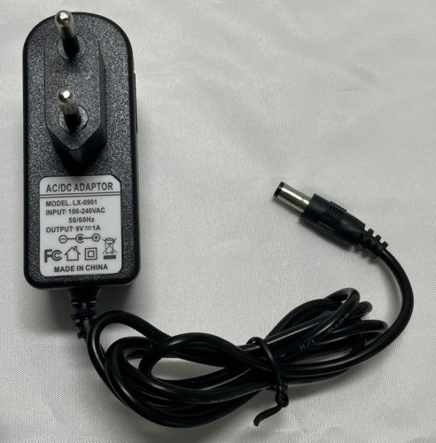 Универсальный блок питания Адаптер 9V 1A (9 вольт 1 ампер) AC/DC Adaptor LX0901