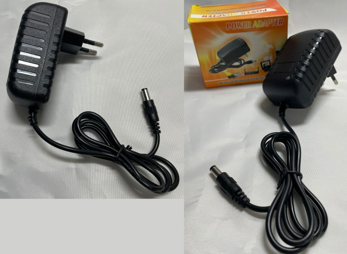 Универсальный блок питания Адаптер 24V 1A (24 вольта 1 ампер) AC/DC Adaptor LX2410